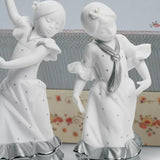 Set 2 figurine din portelan, Spring Fair in Sevilla Platinum - LLADRO Set 2 figurine din portelan, Spring Fair in Sevilla Platinum - LLADRO