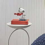 Sculptura din portelan Flying Snoopy by Eva Maria Cuerva - LLADRO Sculptura din portelan Flying Snoopy by Eva Maria Cuerva - LLADRO