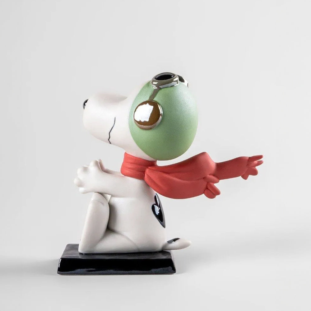 Sculptura din portelan Flying Snoopy by Eva Maria Cuerva - LLADRO Sculptura din portelan Flying Snoopy by Eva Maria Cuerva - LLADRO